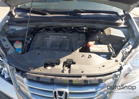 2010 Honda Odyssey Touring z USA, uszkodzony, nr VIN 5FNRL3H99AB012136